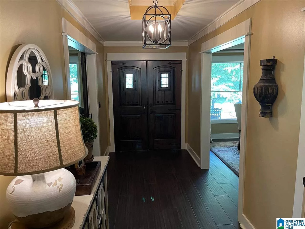 Inspiration for a rustic entryway remodel in Birmingham