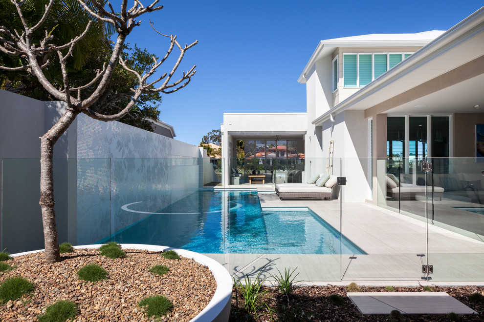 Photo of a large contemporary pool in Sunshine Coast.