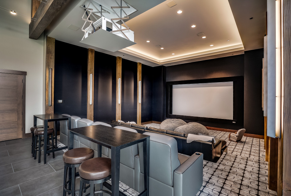 Photo of a country home theatre in Seattle with white walls, carpet and grey floor.