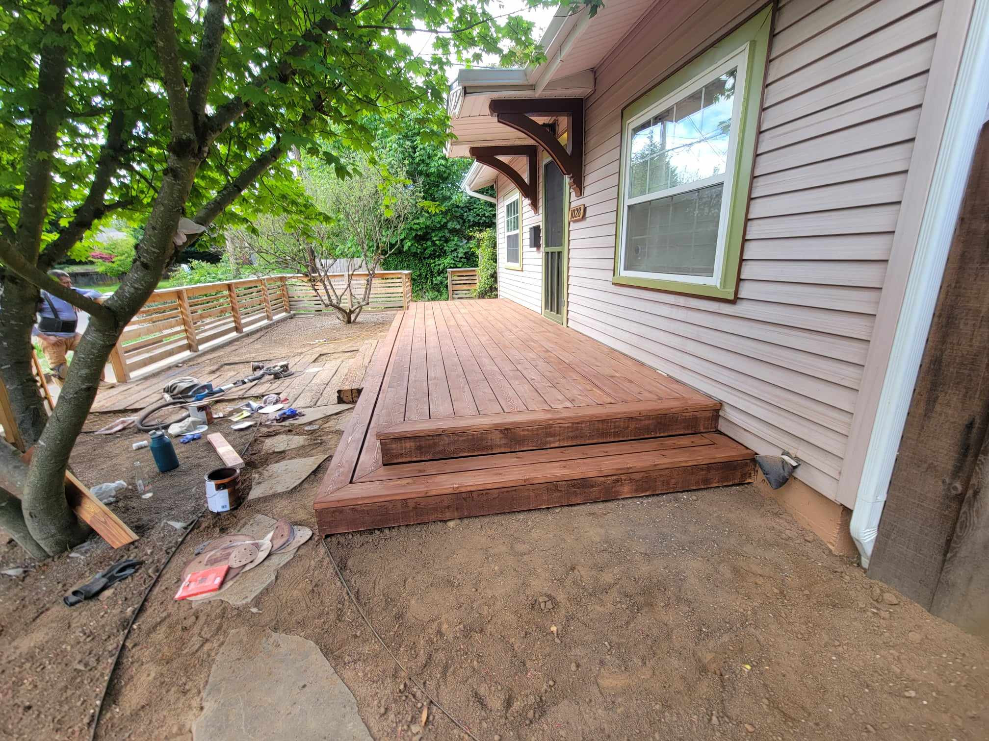 Tight knot cedar deck with rusticana stain