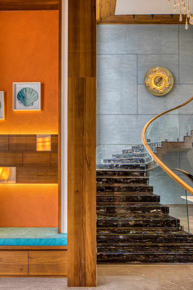 Design ideas for a contemporary Curved staircase in Ahmedabad.