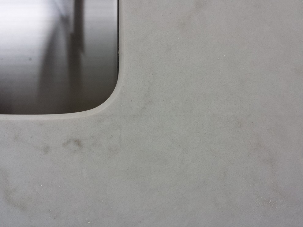 How to remove silicone smudges and templating marks on quartz?