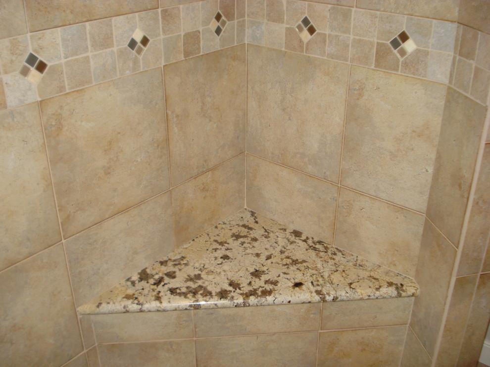 Example of a mid-sized transitional ceramic tile ceramic tile alcove shower design