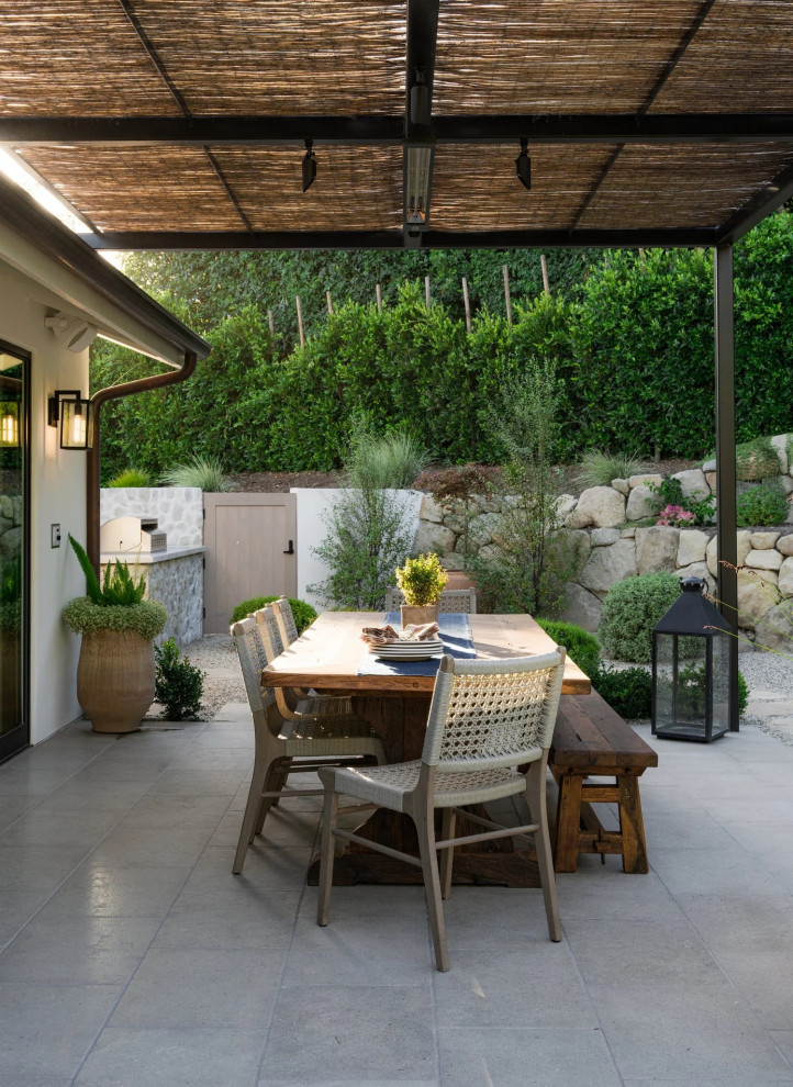 Example of a transitional patio design in Santa Barbara