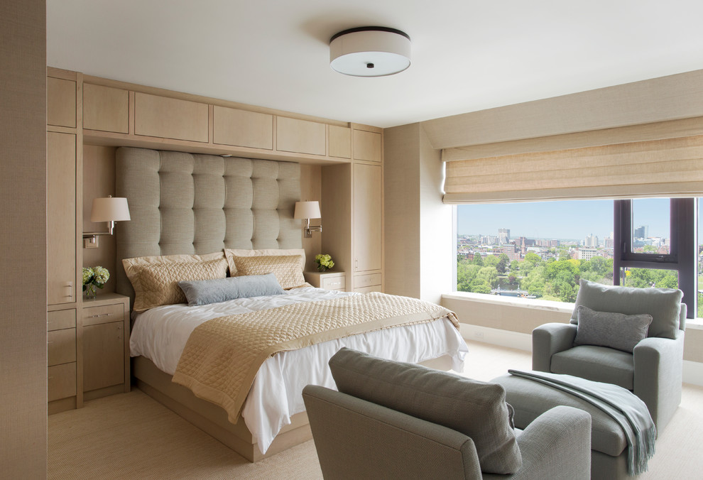 Design ideas for a large contemporary master bedroom in Boston with beige walls and carpet.