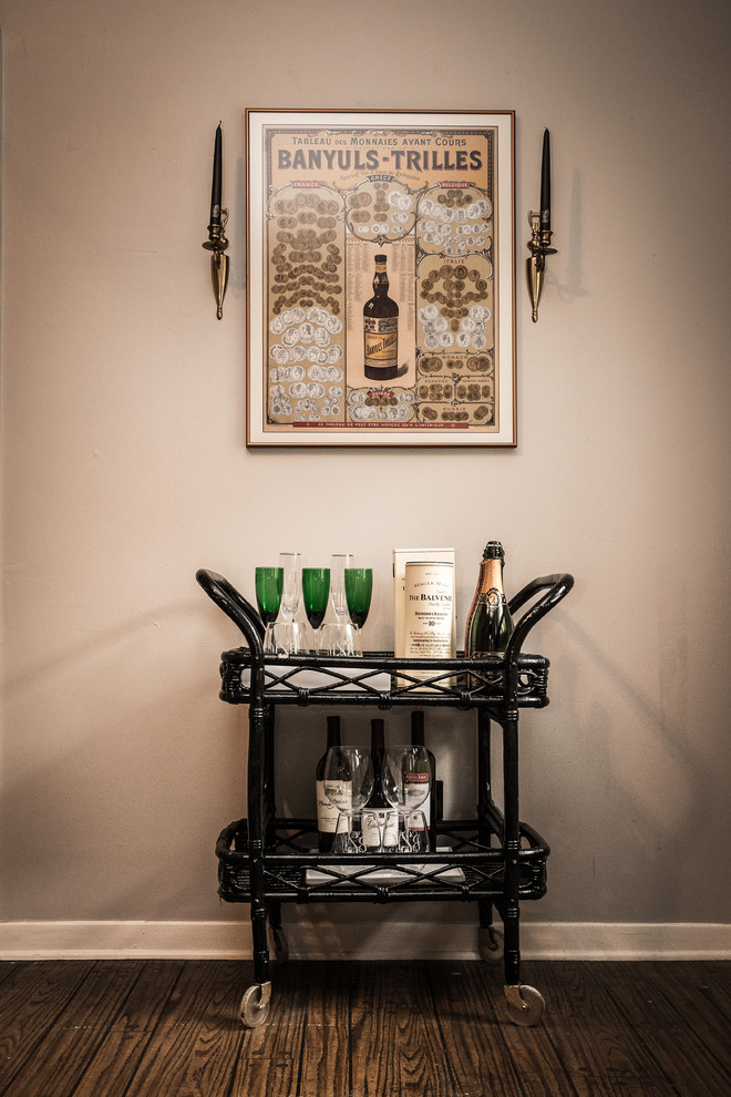 Inspiration for a mid-sized transitional dark wood floor and brown floor enclosed dining room remodel in New Orleans with beige walls and no fireplace