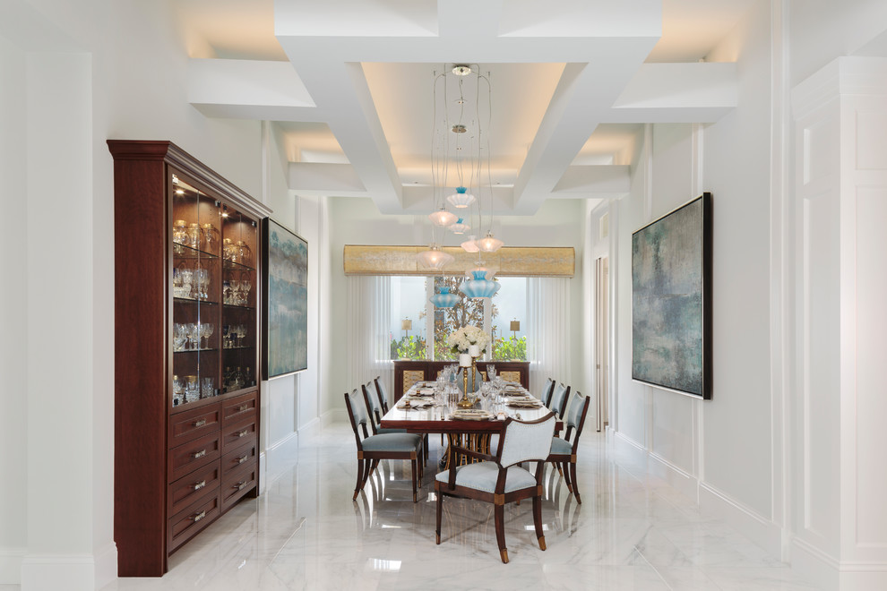 Enclosed dining room - transitional white floor enclosed dining room idea in Miami with white walls and no fireplace