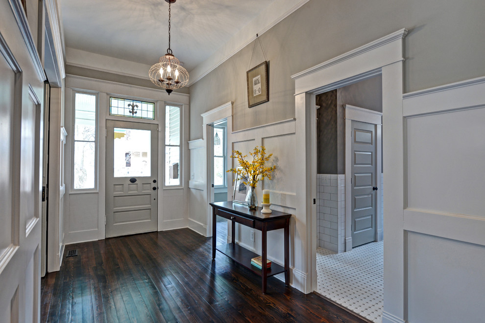 Design ideas for a mid-sized traditional hallway in Atlanta with grey walls and dark hardwood floors.