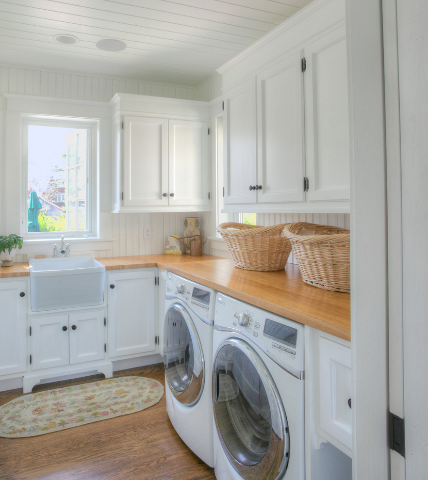 Design ideas for a traditional laundry room in Bridgeport with a farmhouse sink and beige benchtop.