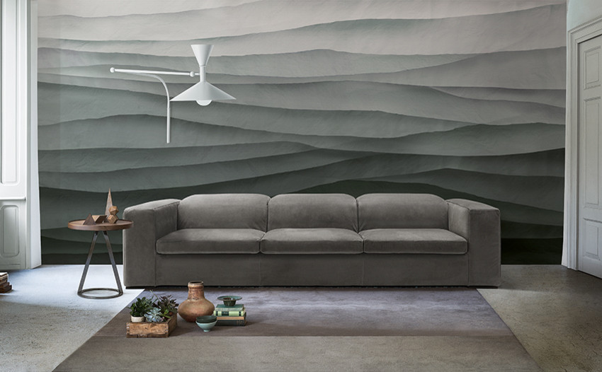 Design ideas for a large modern enclosed family room in Bologna with grey walls and concrete floors.
