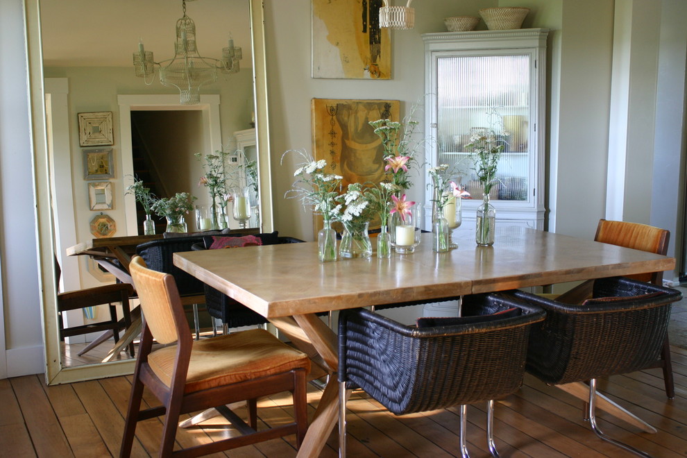 Traditional dining room in Chicago with beige walls and medium hardwood floors.