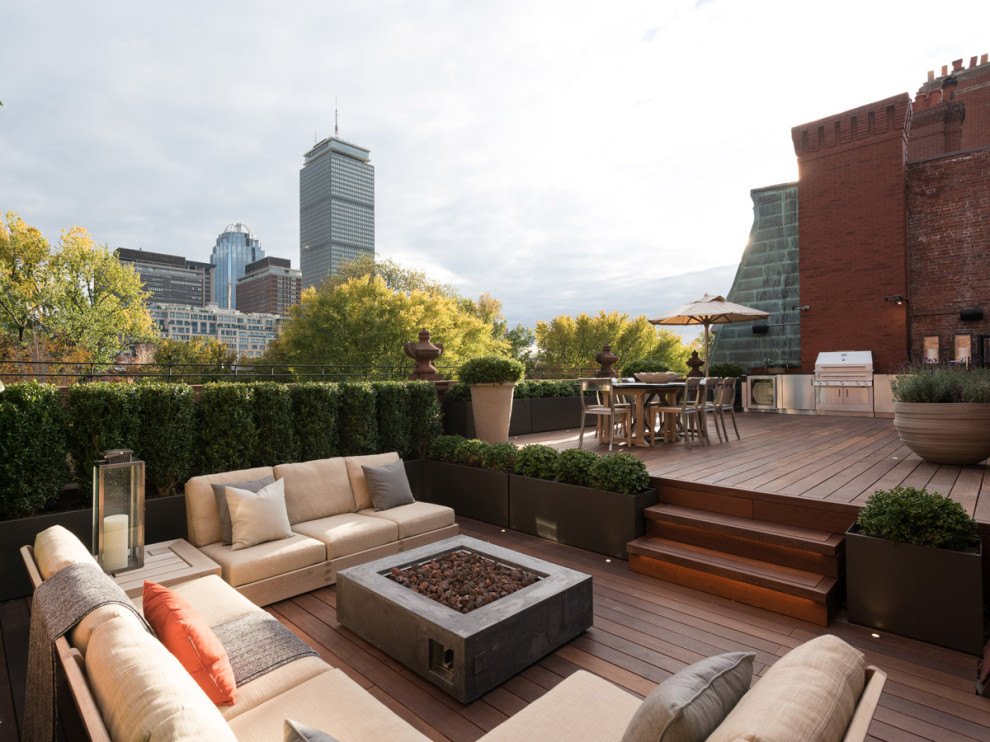 This is an example of a mid-sized modern deck in Boston.