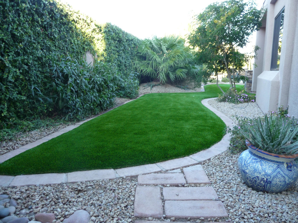 Inspiration for a large transitional partial sun backyard gravel garden path in Phoenix.