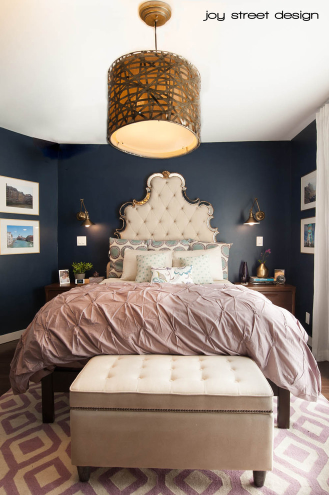 Mid-sized transitional master bedroom in Los Angeles with blue walls, medium hardwood floors and no fireplace.