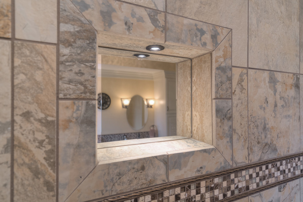 Home design - mid-sized transitional master multicolored tile ceramic tile home design idea with raised-panel cabinets, beige cabinets, a two-piece toilet, beige walls, an undermount sink and quartz countertops