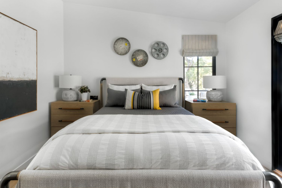 Inspiration for a mid-sized contemporary master medium tone wood floor bedroom remodel in Los Angeles with white walls and no fireplace