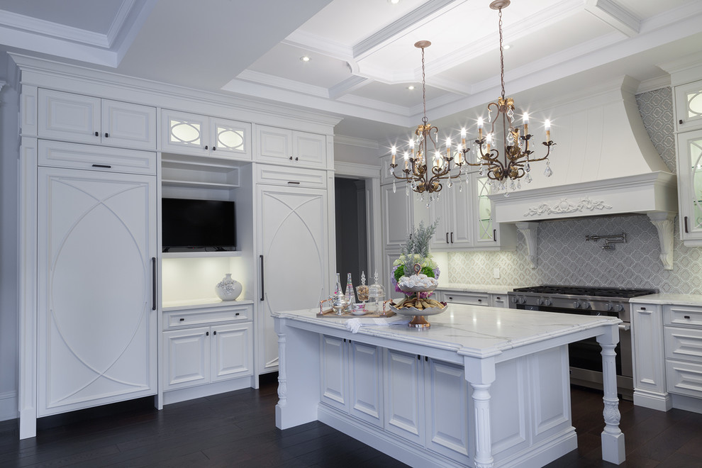 Design ideas for a large traditional u-shaped separate kitchen in Toronto with a farmhouse sink, raised-panel cabinets, white cabinets, marble benchtops, multi-coloured splashback, window splashback, stainless steel appliances, dark hardwood floors and with island.
