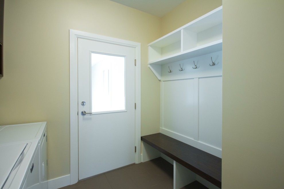 Photo of a transitional laundry room in Vancouver.