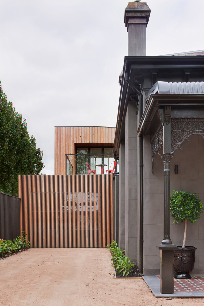 Small contemporary attached one-car garage in Melbourne.