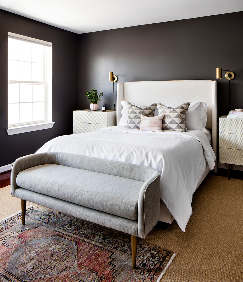 Photo of a mid-sized transitional master bedroom in Baltimore with black walls, dark hardwood floors and brown floor.
