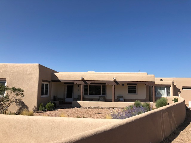 Exterior Facelift: Stucco & Porch Project