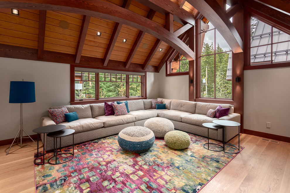 Design ideas for a country family room in Other with white walls, medium hardwood floors and brown floor.