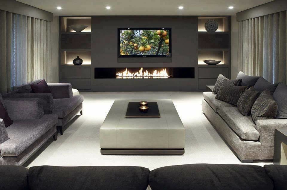 Design ideas for a large modern home theatre in Sydney with grey walls and a wall-mounted tv.