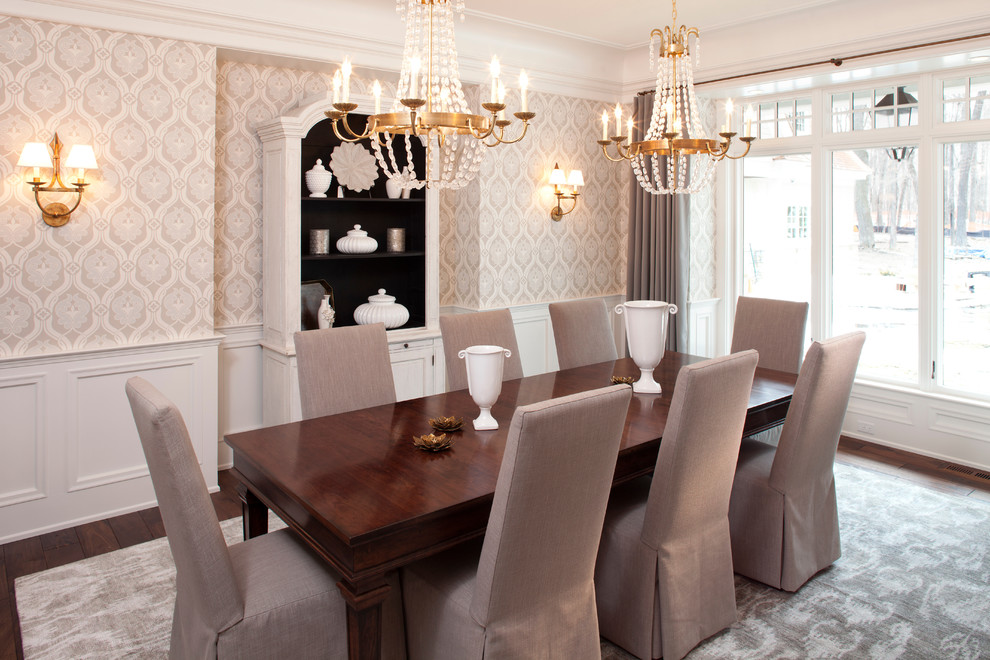 Inspiration for a traditional dining room in Minneapolis with multi-coloured walls and dark hardwood floors.