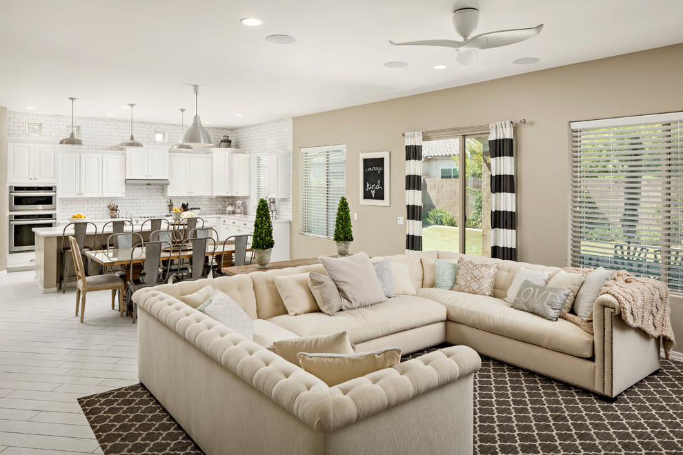 Inspiration for a large eclectic formal open concept living room in Phoenix with grey walls, porcelain floors, no fireplace and a wall-mounted tv.
