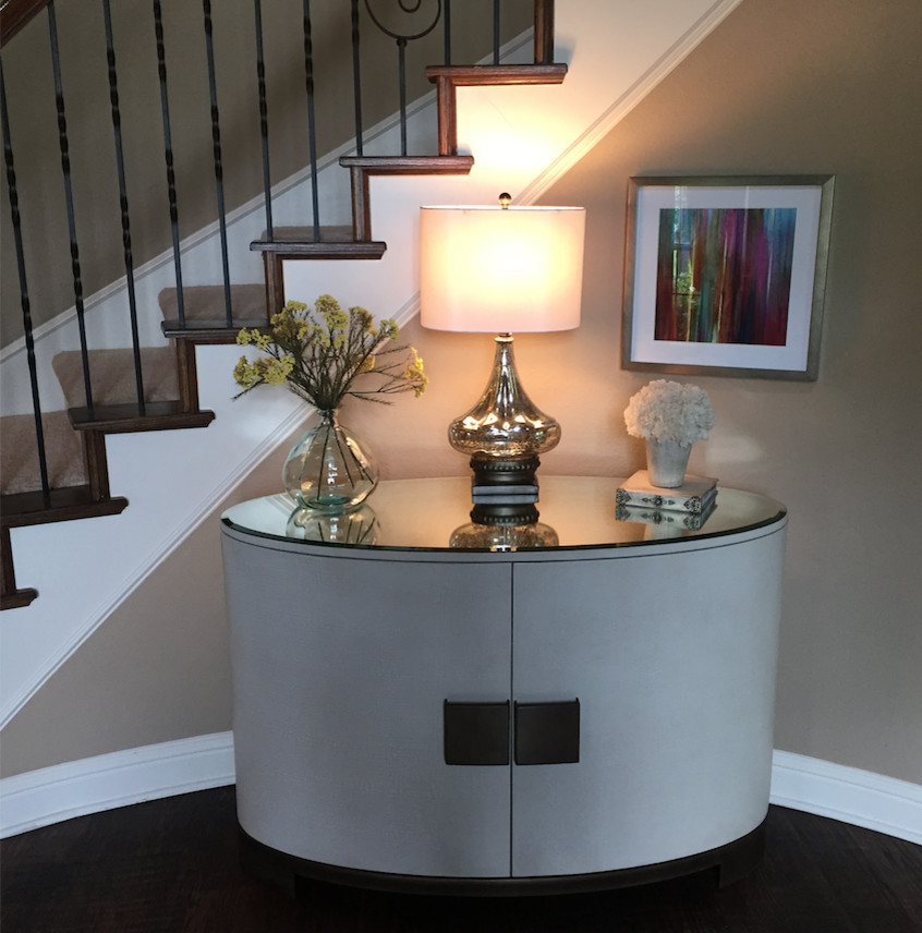 Inspiration for a mid-sized transitional dark wood floor and brown floor foyer remodel in Dallas with beige walls