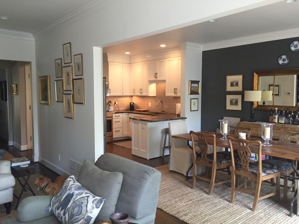 This is an example of a small traditional open plan dining in Louisville with grey walls and dark hardwood floors.