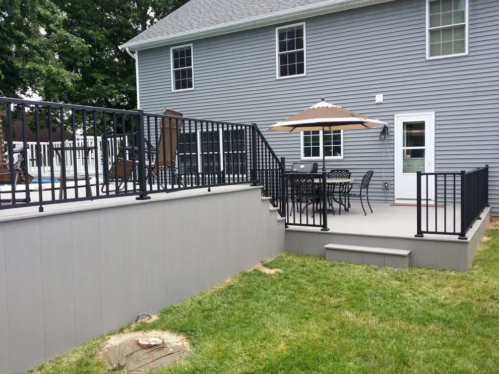 Large backyard deck photo with no cover