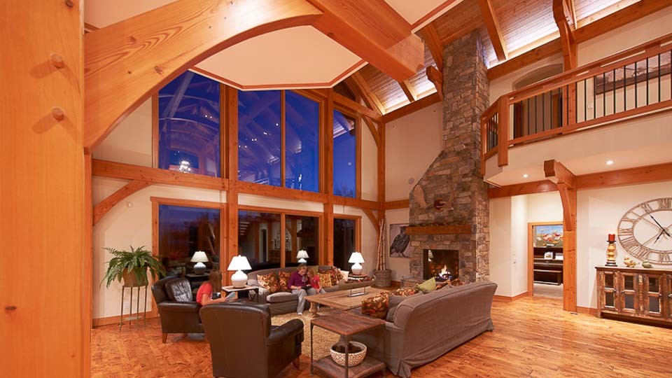 Inspiration for an arts and crafts loft-style living room in Vancouver with a standard fireplace and a stone fireplace surround.