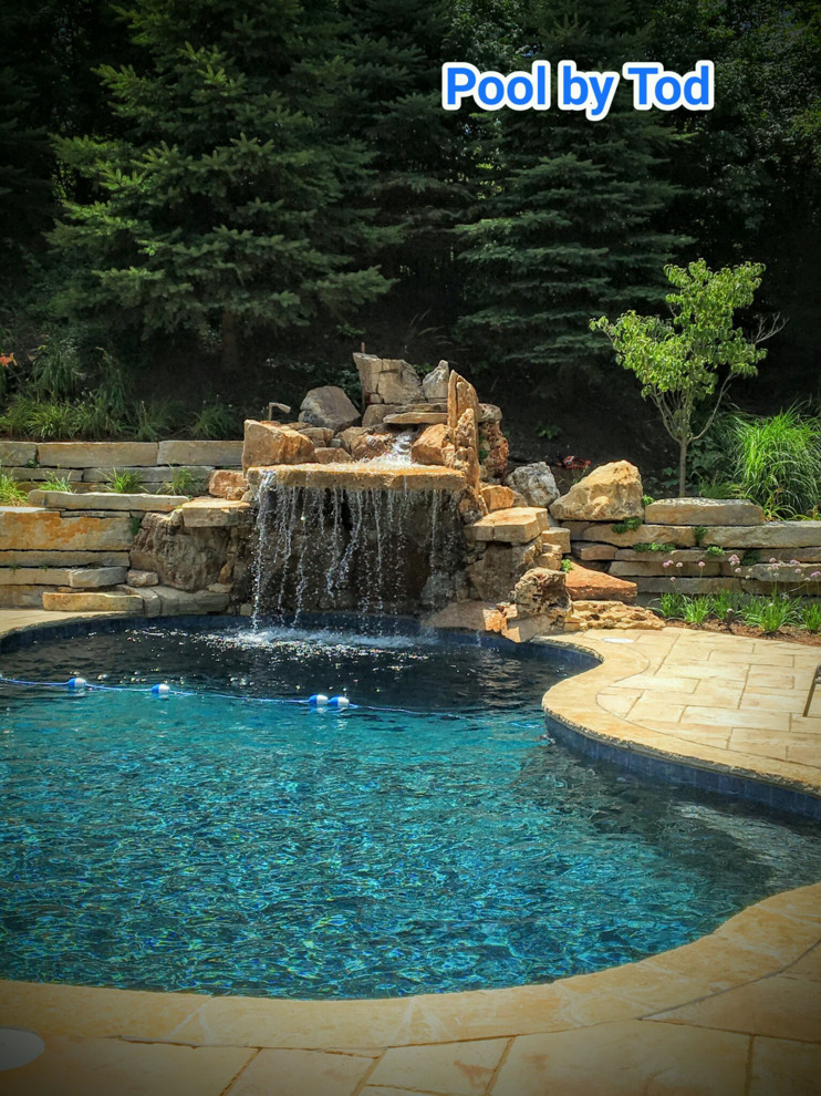A pool, spa and water feature that I designed in a Southern Chicago suburb.  Bui