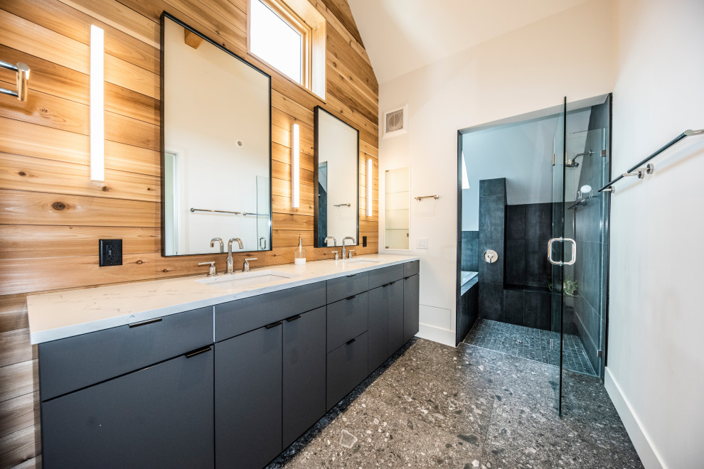 Photo of a large contemporary master wet room bathroom in Other with flat-panel cabinets, grey cabinets, an alcove tub, a one-piece toilet, black tile, slate, white walls, marble floors, an undermount sink, marble benchtops, grey floor, a hinged shower door, white benchtops, an enclosed toilet, a double vanity, a built-in vanity, vaulted and wood walls.