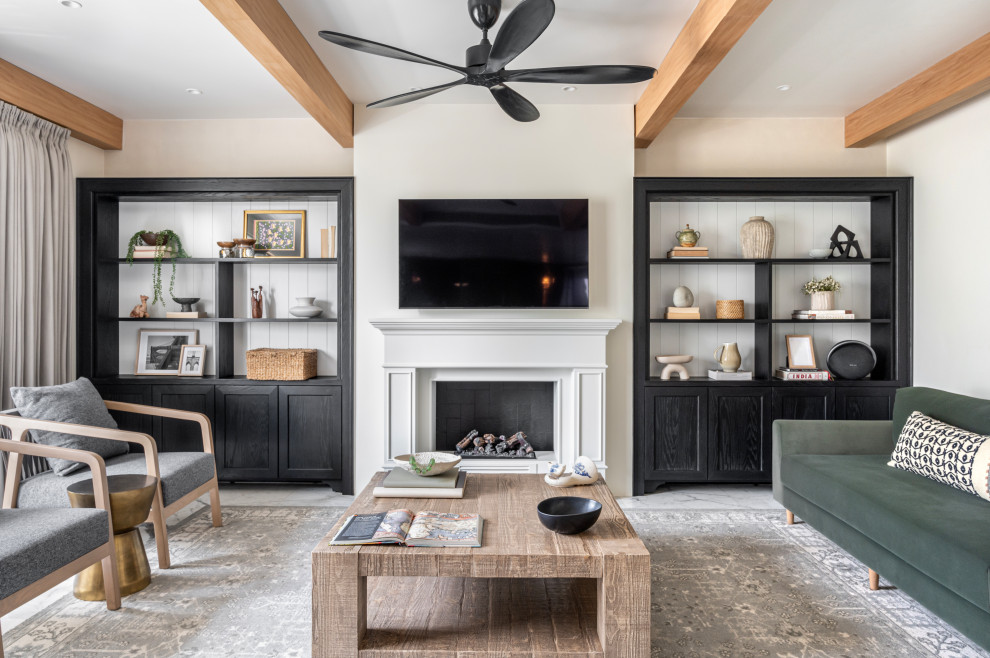 Design ideas for a transitional living room in Delhi With White Walls and a Wall-mounted TV.