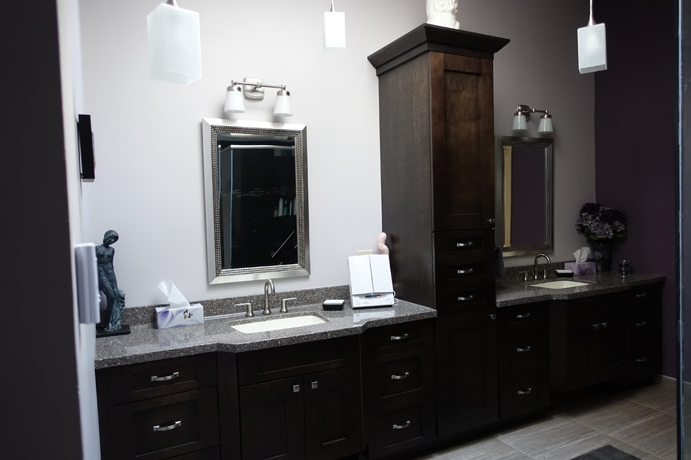 Design ideas for a large transitional bathroom in Other with shaker cabinets, dark wood cabinets, solid surface benchtops, white walls, porcelain floors and an undermount sink.