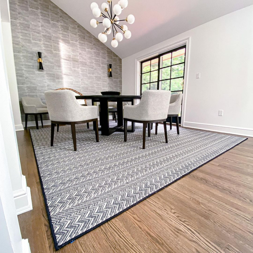 This is an example of a contemporary dining room in Philadelphia with carpet and grey floors.
