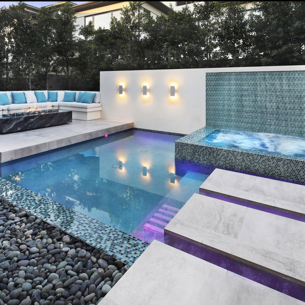 Photo of a modern backyard pool in Los Angeles with with a pool.