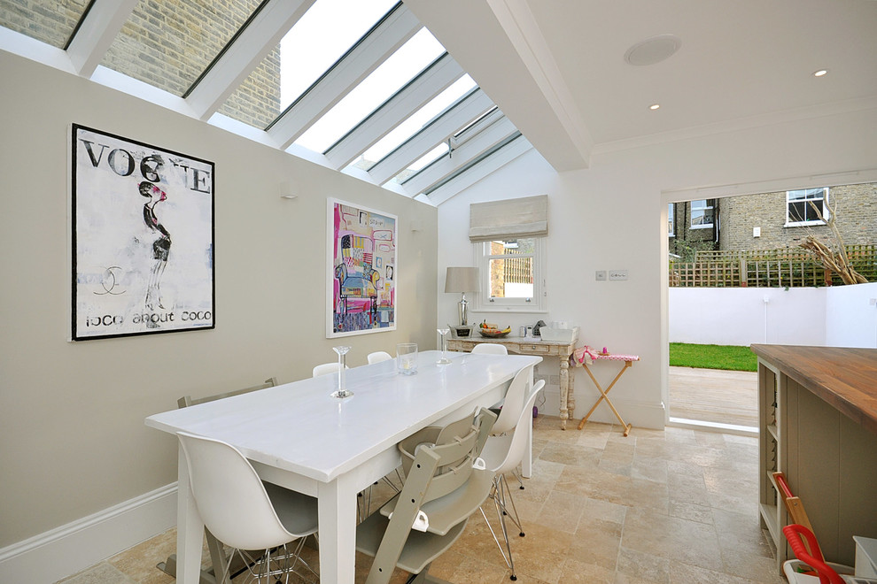 Contemporary eat-in kitchen in London.