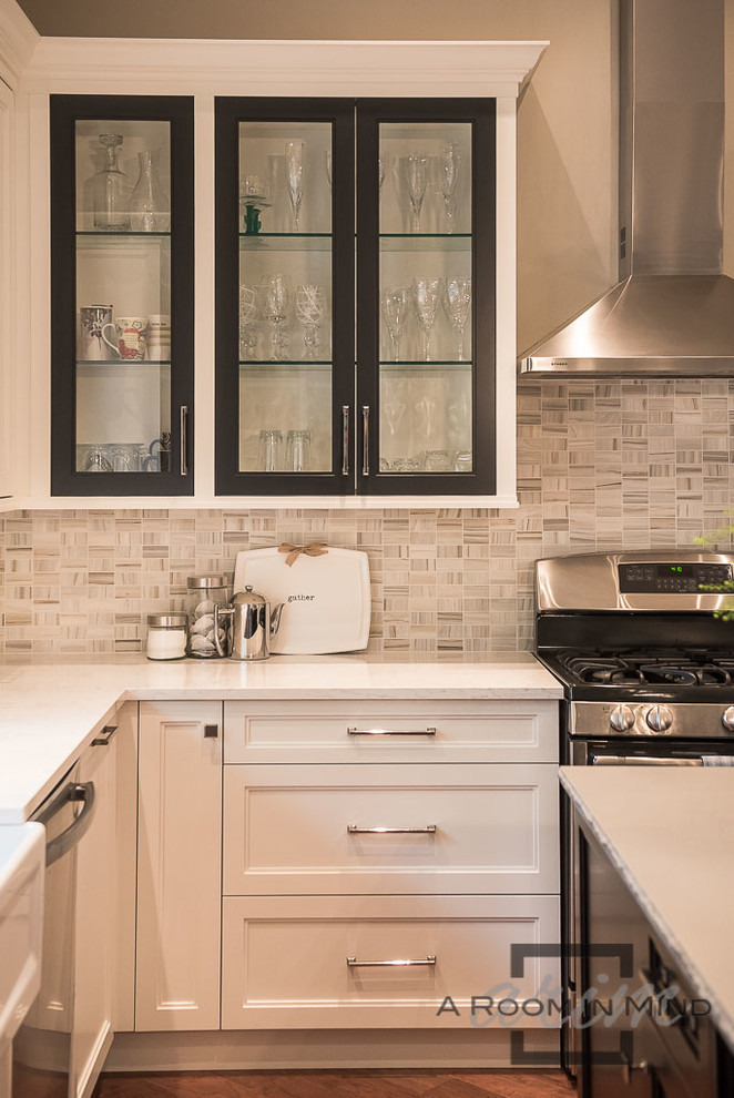 Example of a transitional kitchen design in Toronto