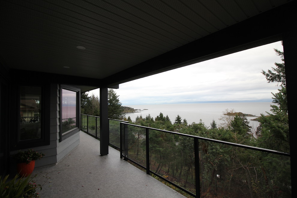 Inspiration for a large modern backyard deck remodel