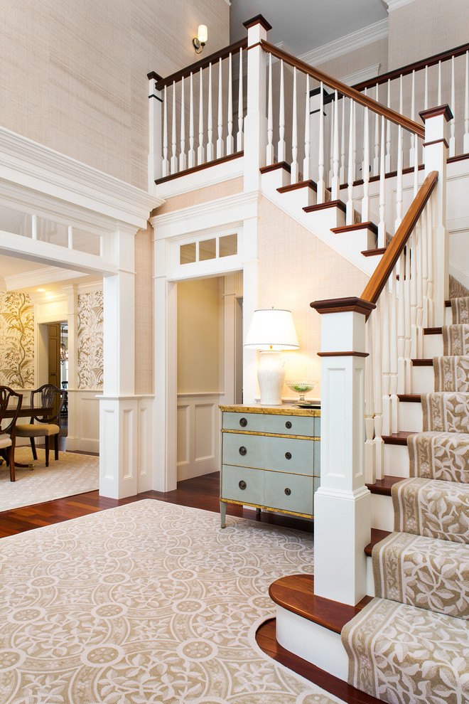 Design ideas for a traditional wood l-shaped staircase in Boston with painted wood risers.