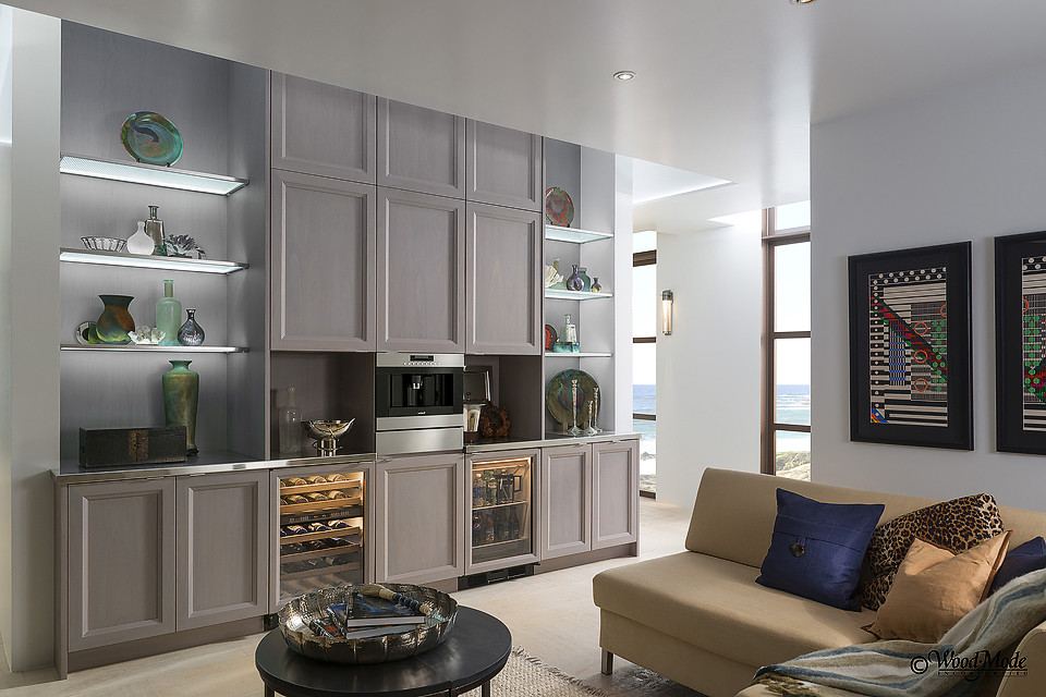 Design ideas for a large contemporary single-wall wet bar in Houston with recessed-panel cabinets, grey cabinets, stainless steel benchtops and porcelain floors.