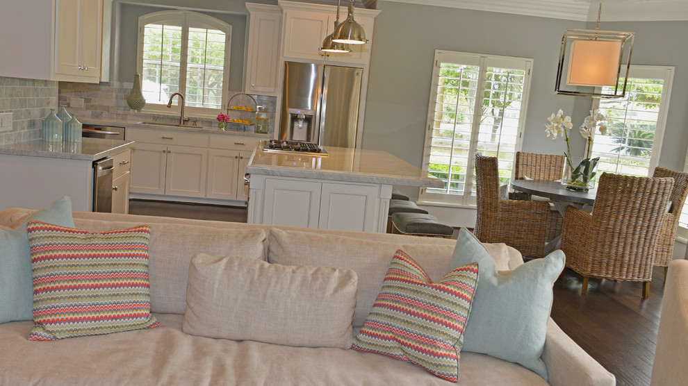 This is an example of a transitional family room in Houston.