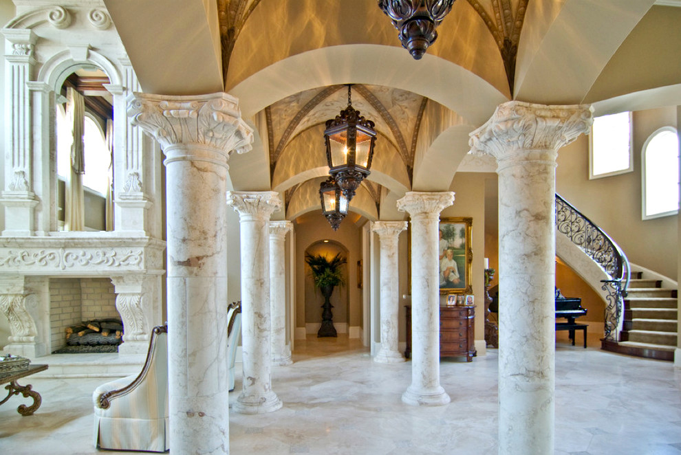 Inspiration for an expansive mediterranean hallway in Other with beige walls and marble floors.