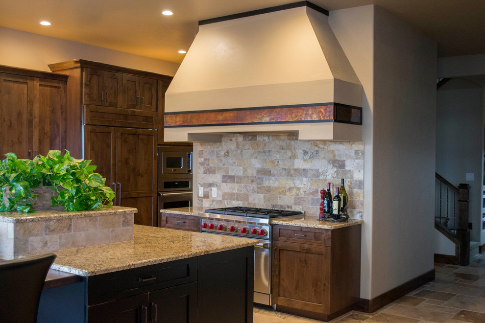Example of a large transitional travertine floor eat-in kitchen design in Denver