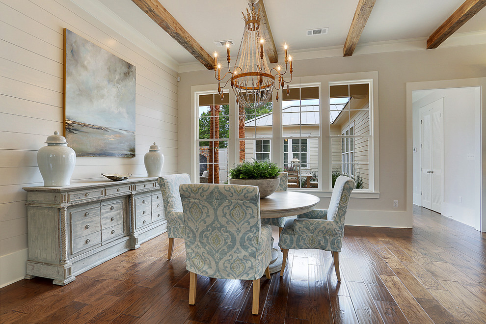 Design ideas for a mid-sized transitional open plan dining in New Orleans with beige walls and medium hardwood floors.