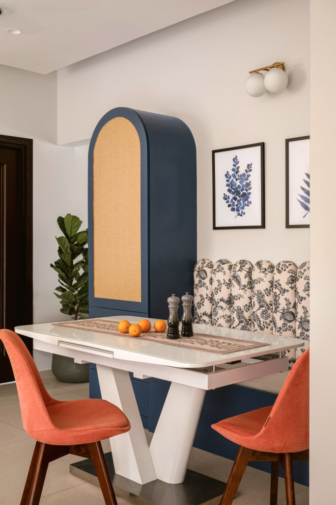 Contemporary dining room in Bengaluru With White Walls.