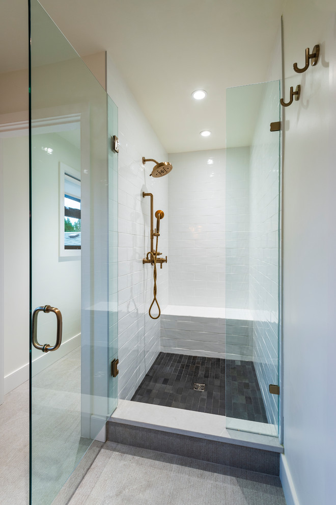 Inspiration for a mid-sized rustic master porcelain tile and gray floor alcove shower remodel in Vancouver with flat-panel cabinets, black cabinets, white walls, an undermount sink, quartz countertops, a hinged shower door and gray countertops